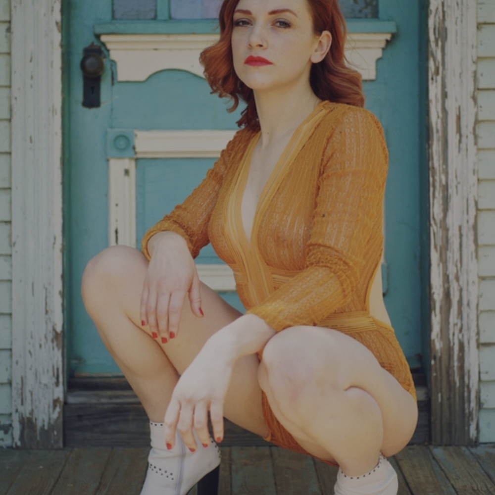 Sheer mustard bodysuit